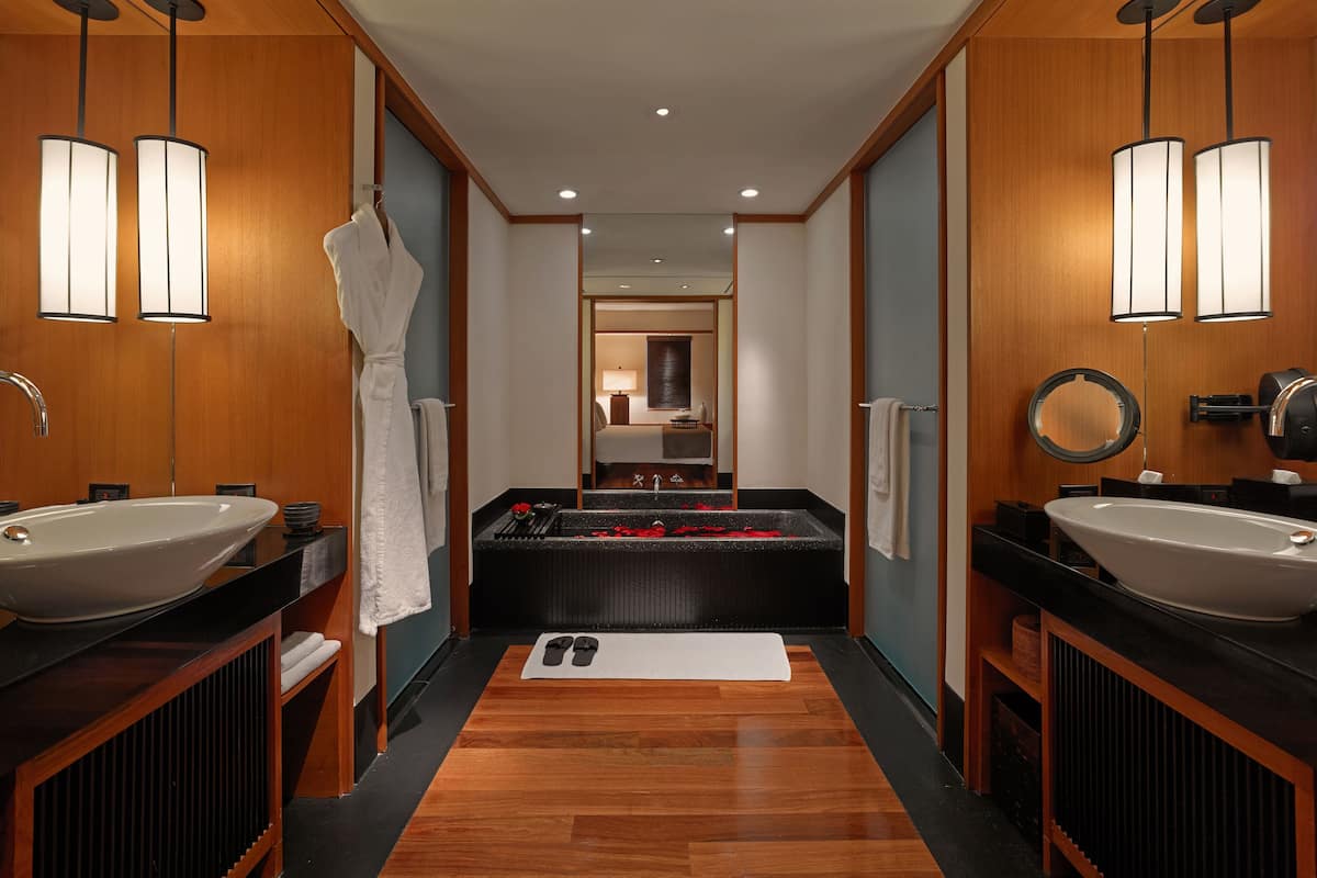 separate bathtub and shower, designer toiletries, hair dryer, bathrobes