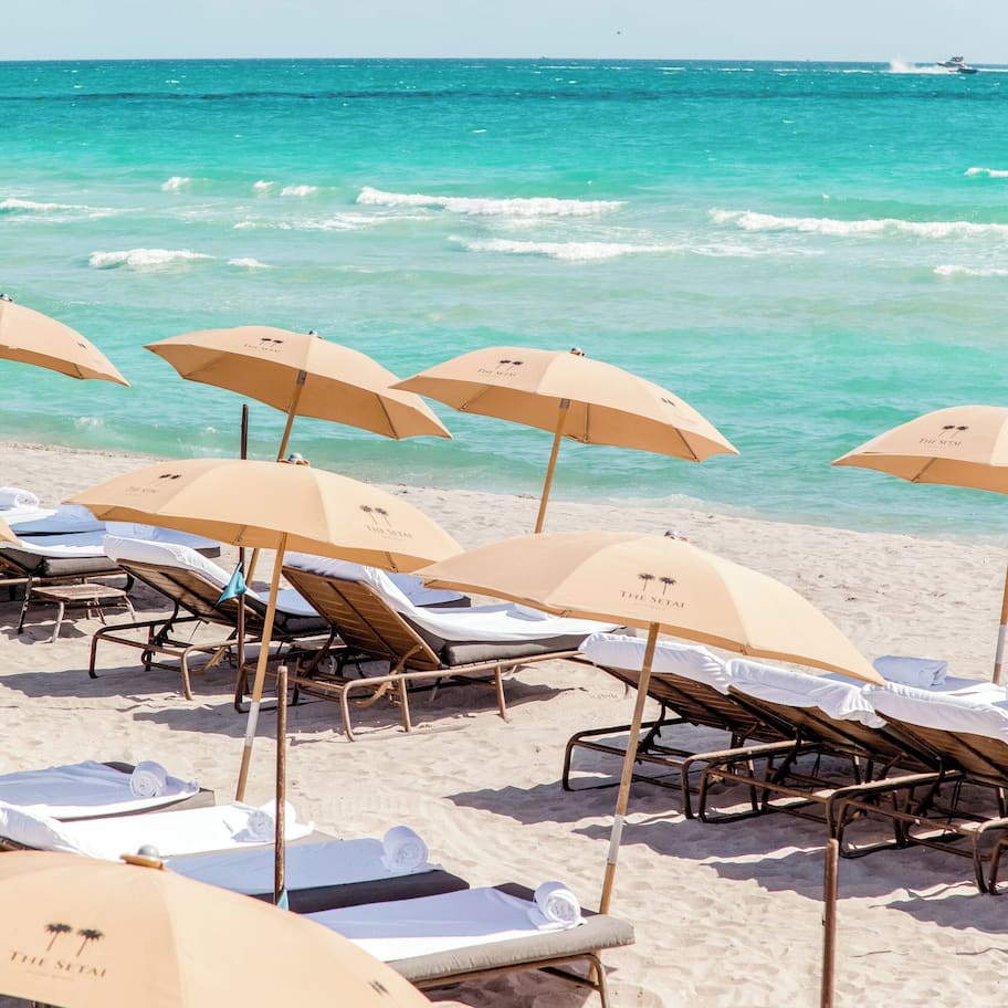 On the beach, sun loungers, beach umbrellas, beach towels