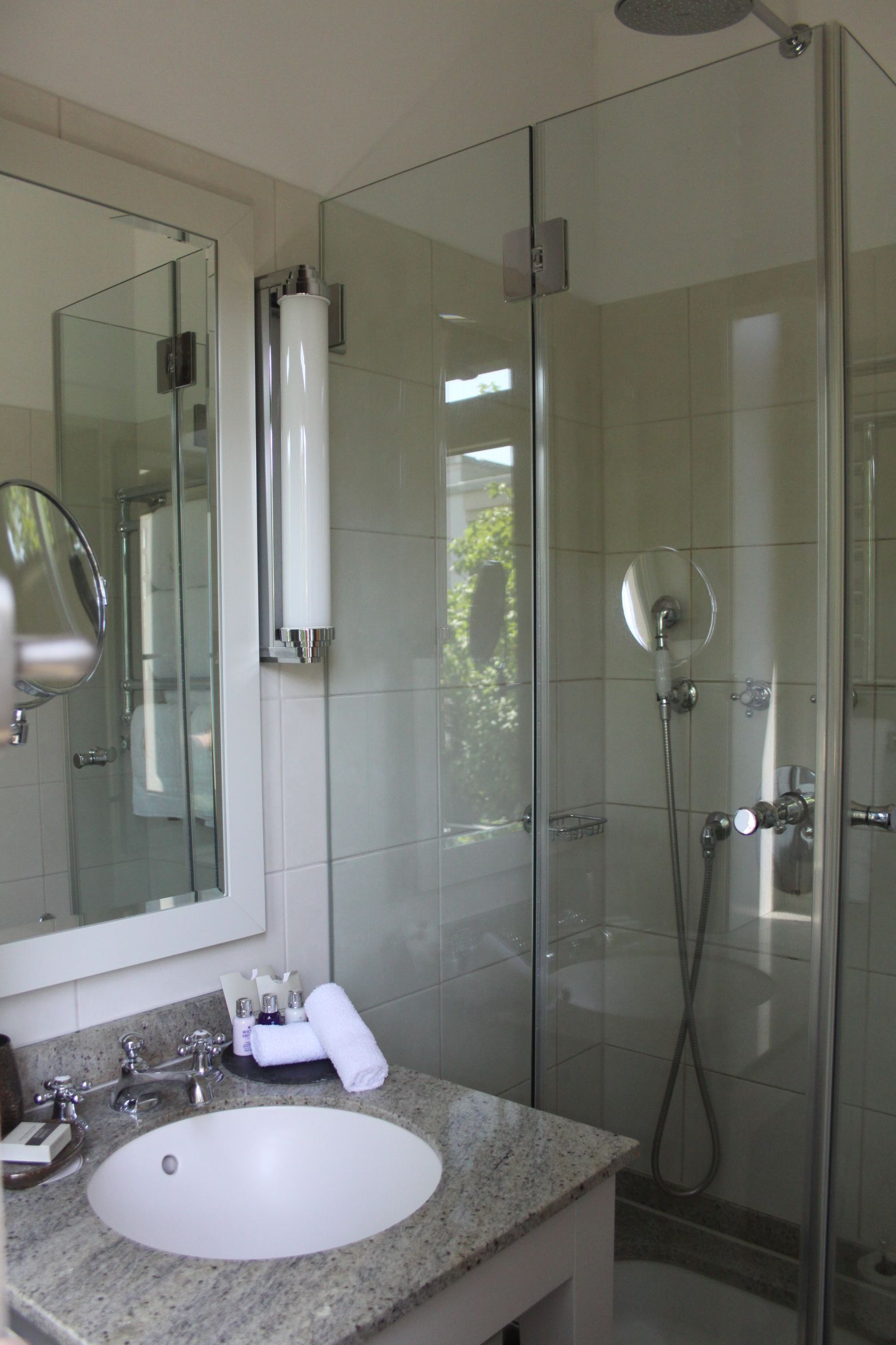 rainfall showerhead, designer toiletries, hair dryer, bathrobes