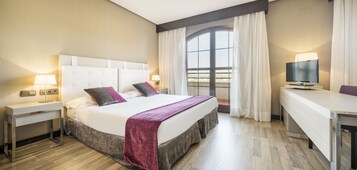 Family Room (2 Adults + 2 Children) | Minibar, in-room safe, desk, laptop workspace