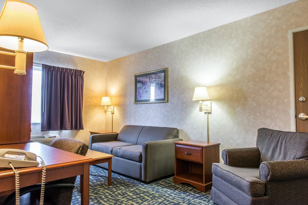 Suite, 1 King Bed with Sofa bed, Non Smoking | Iron/ironing board, WiFi (free), alarm clocks, bed sheets