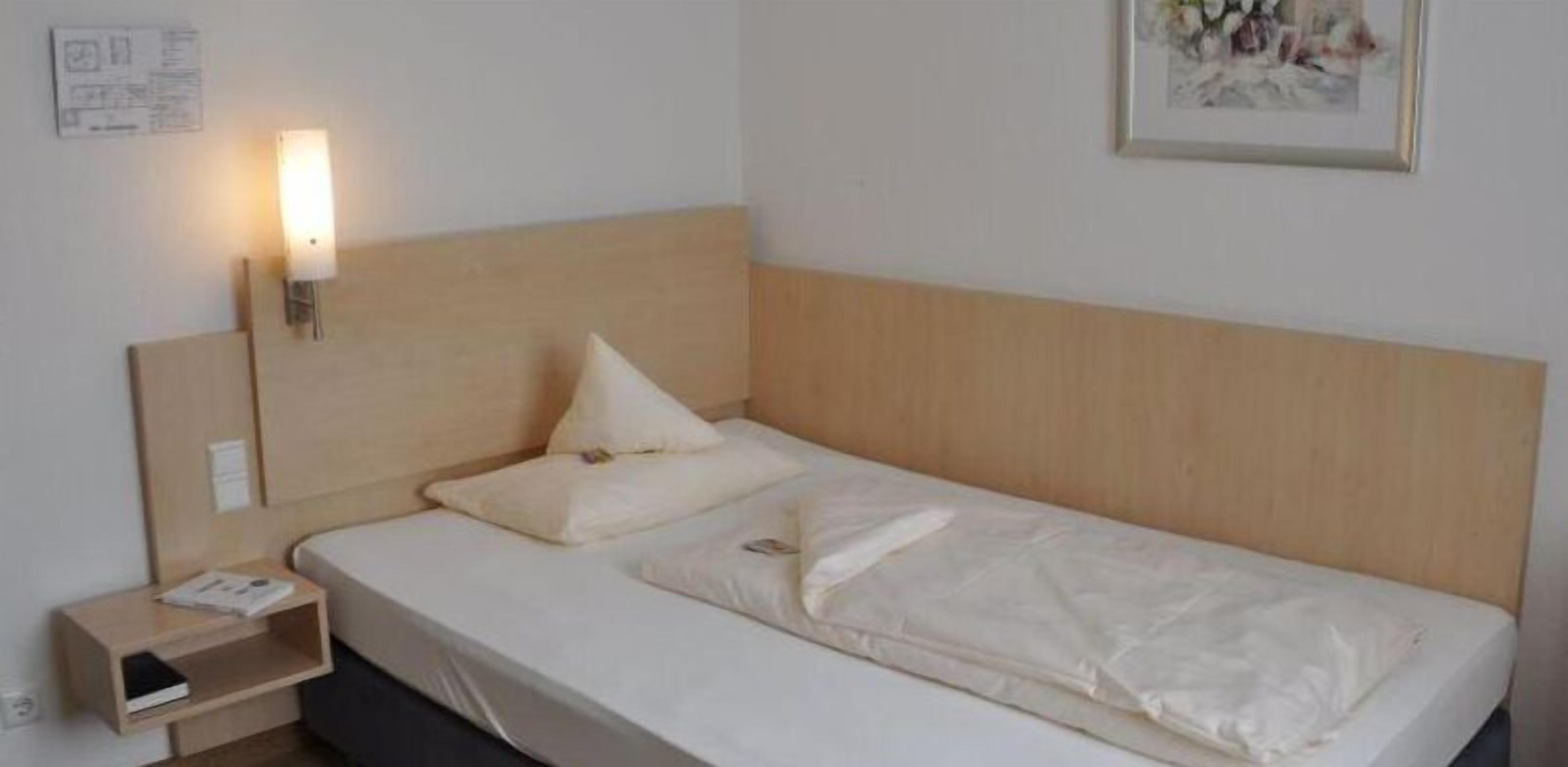 hypo-allergenic bedding, desk, blackout curtains, iron/ironing board