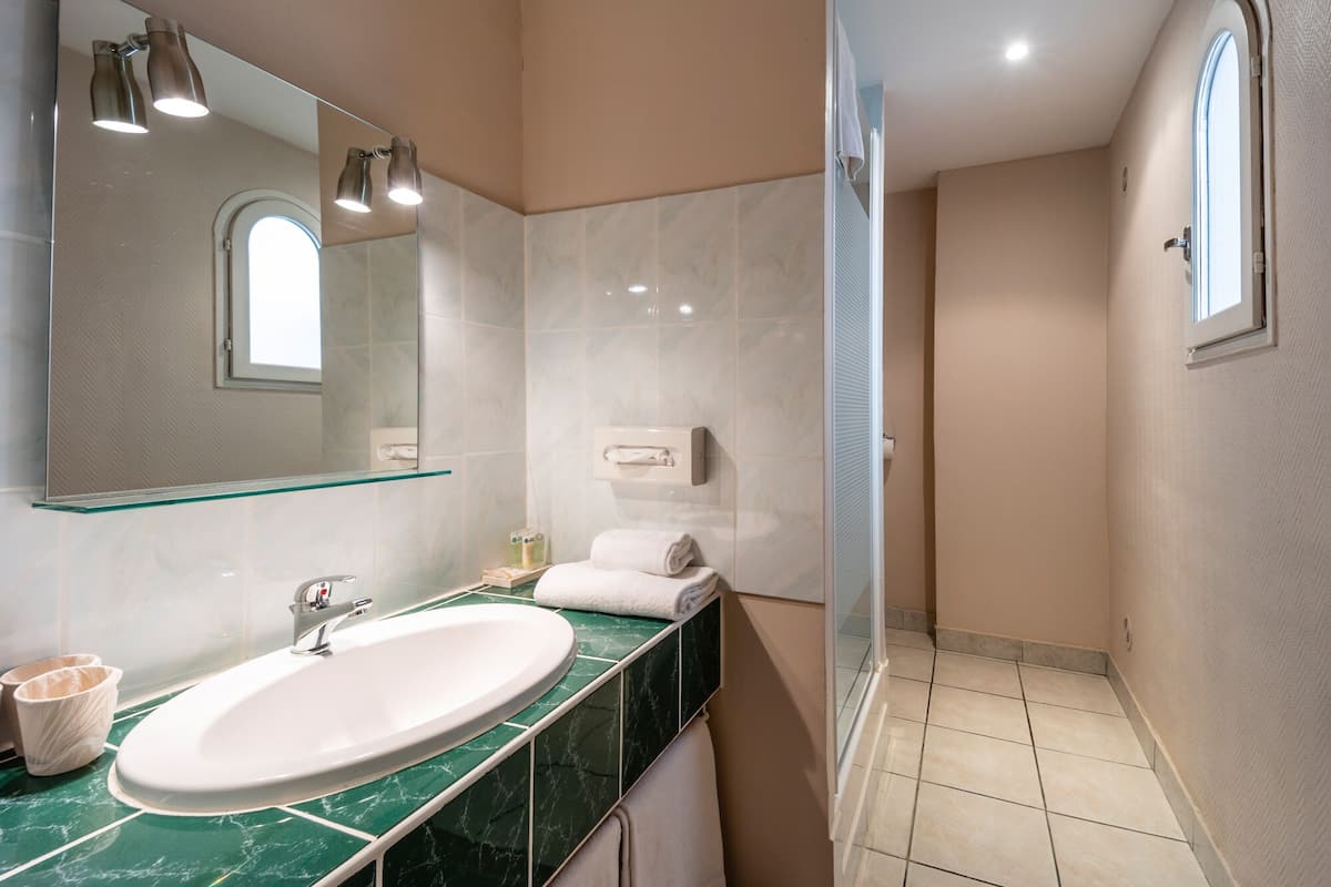 family room, multiple beds, non smoking, city view | bathroom | free toiletries, hair dryer, towels