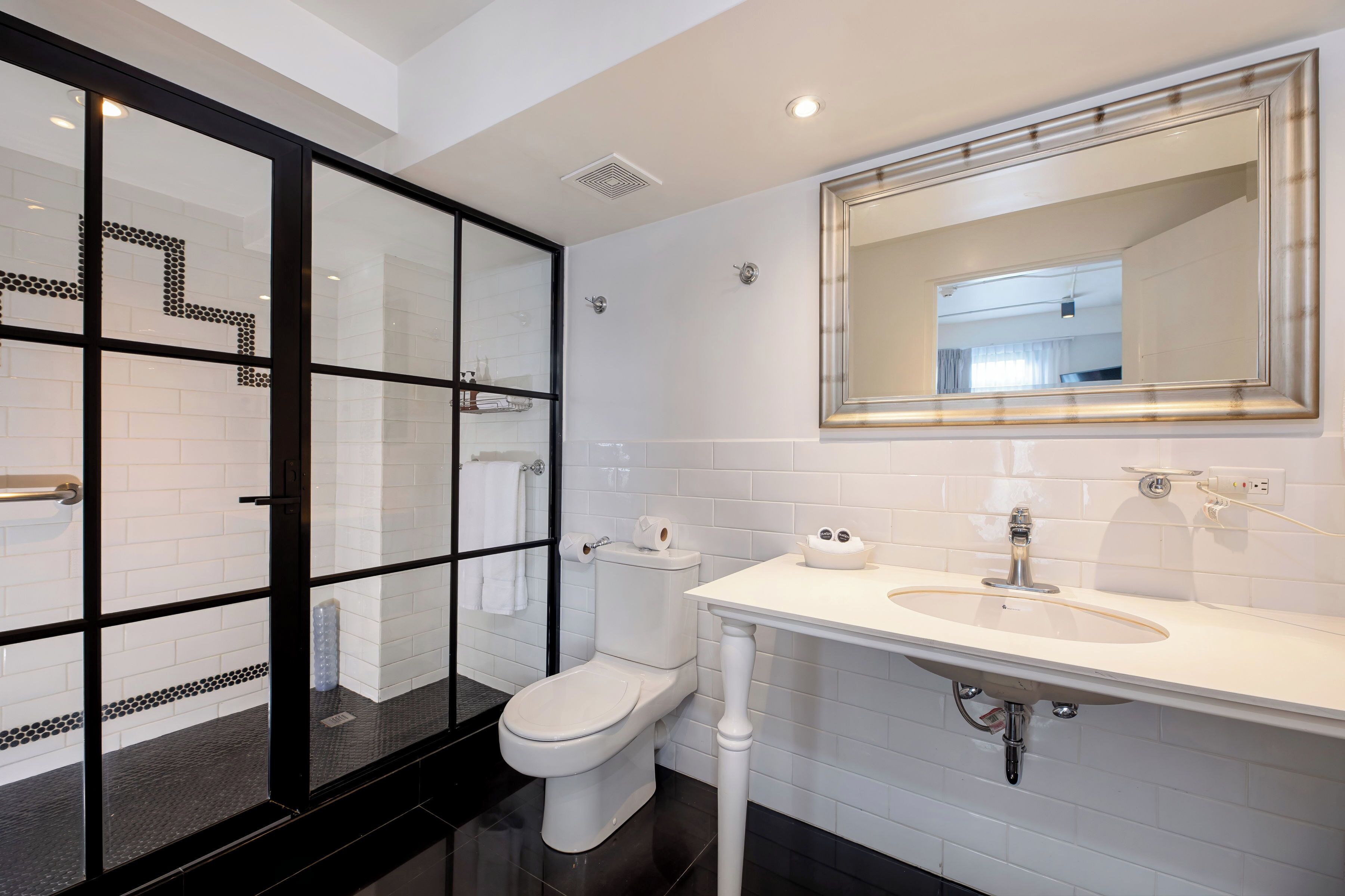 signature room, 1 queen bed (el caballero elegante) | bathroom | shower, designer toiletries, hair dryer, towels