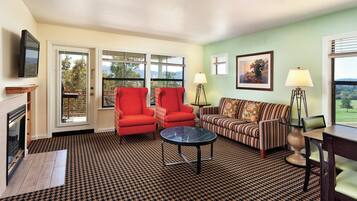 Deluxe Apartment, 3 Bedrooms, Non Smoking | Living room | LCD TV, fireplace, DVD player