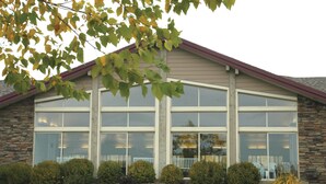 A building with large windows and a stone facade. - WorldMark Bear Lake (Garden City)