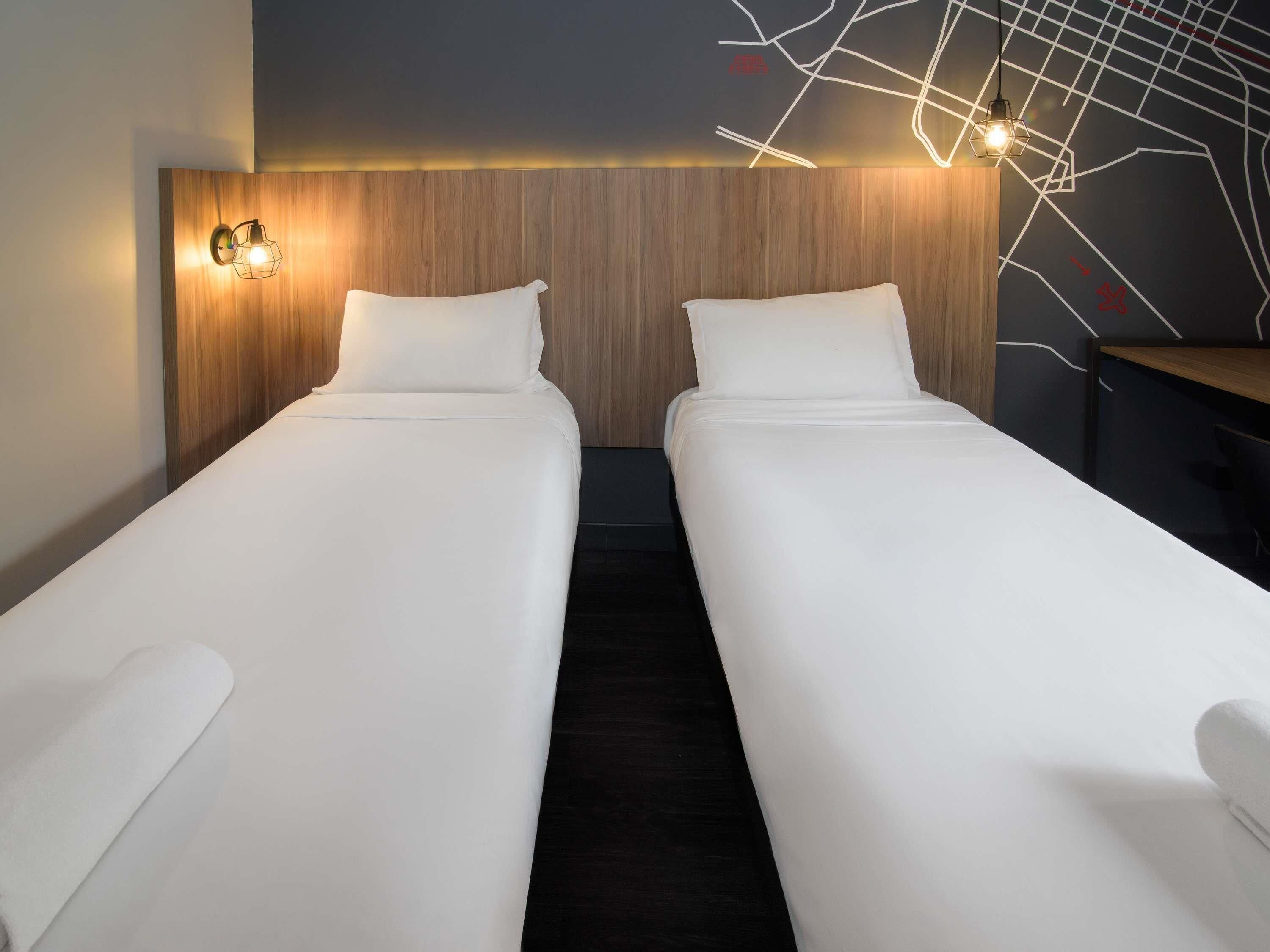 Standard Apartment, 2 Twin Beds | Minibar, in-room safe, desk, soundproofing