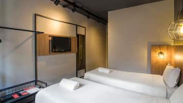 Standard-Apartment, 2 Einzelbetten | Minibar, Zimmersafe, Schreibtisch, schallisolierte Zimmer