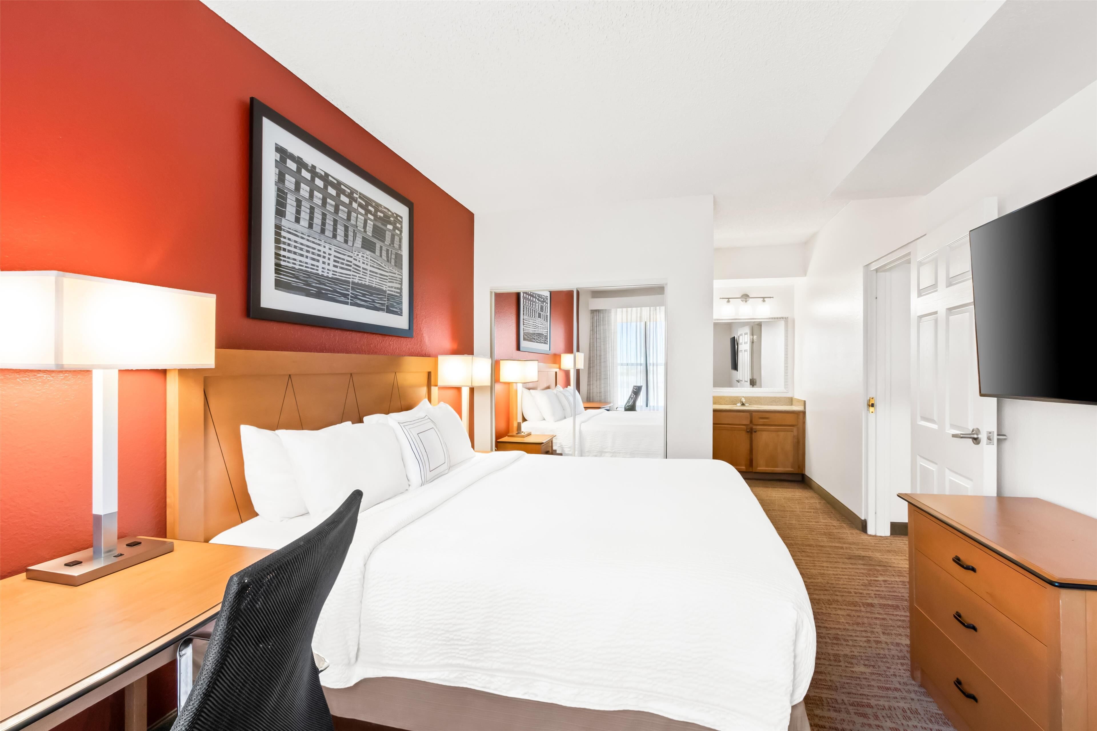 suite, multiple beds, roll-in shower | in-room safe, desk, iron/ironing board, free rollaway beds