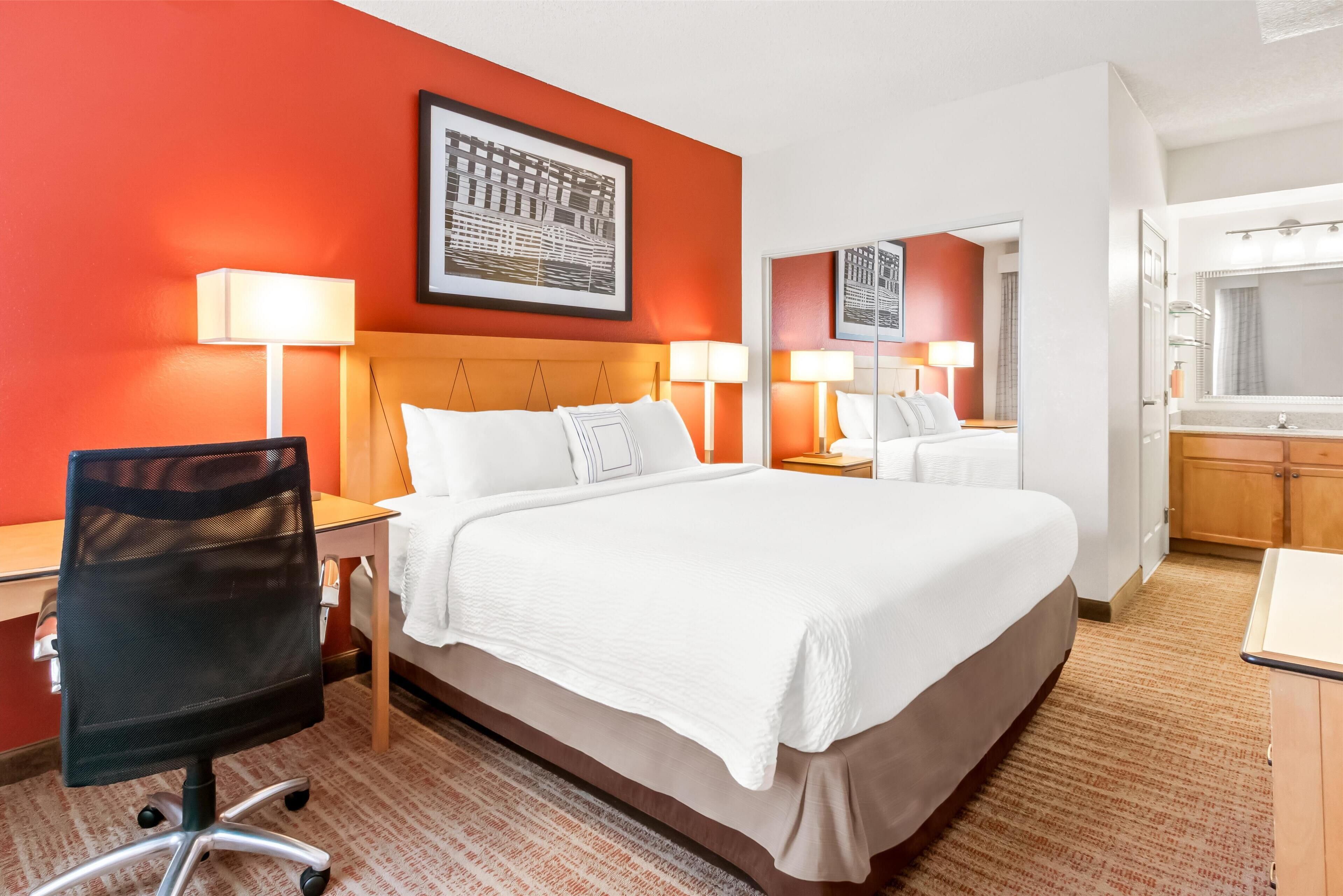 suite, multiple beds, roll-in shower | in-room safe, desk, iron/ironing board, free rollaway beds