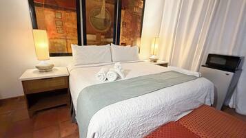 Blackout drapes, iron/ironing board, free WiFi, bed sheets