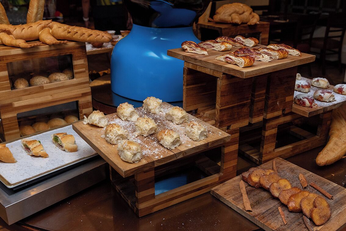 A bakery display with various baked goods.