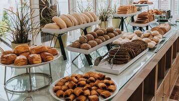 Daily buffet breakfast (EUR 11.9 per person)