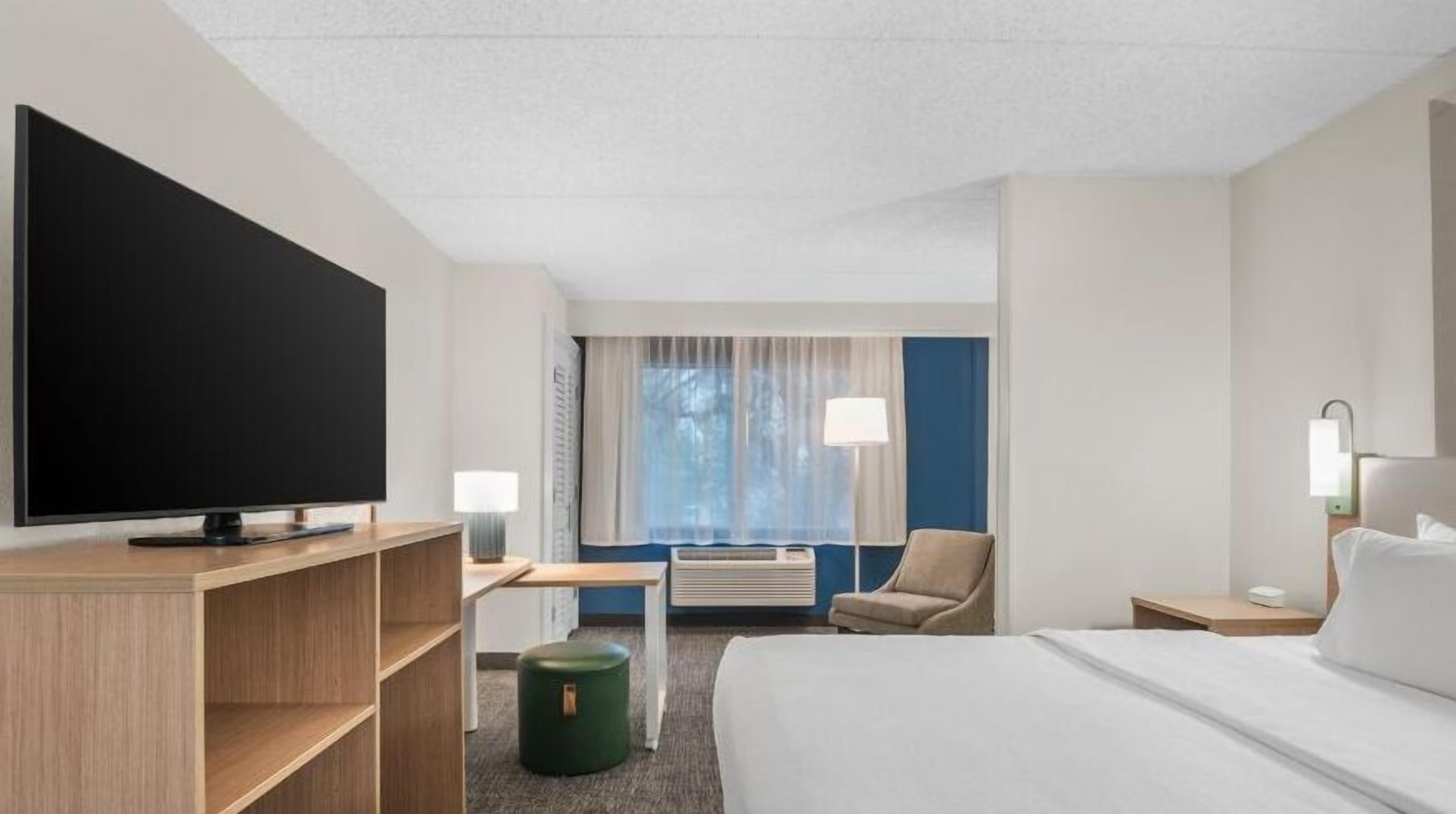 desk, blackout curtains, iron/ironing board, free cots/infant beds