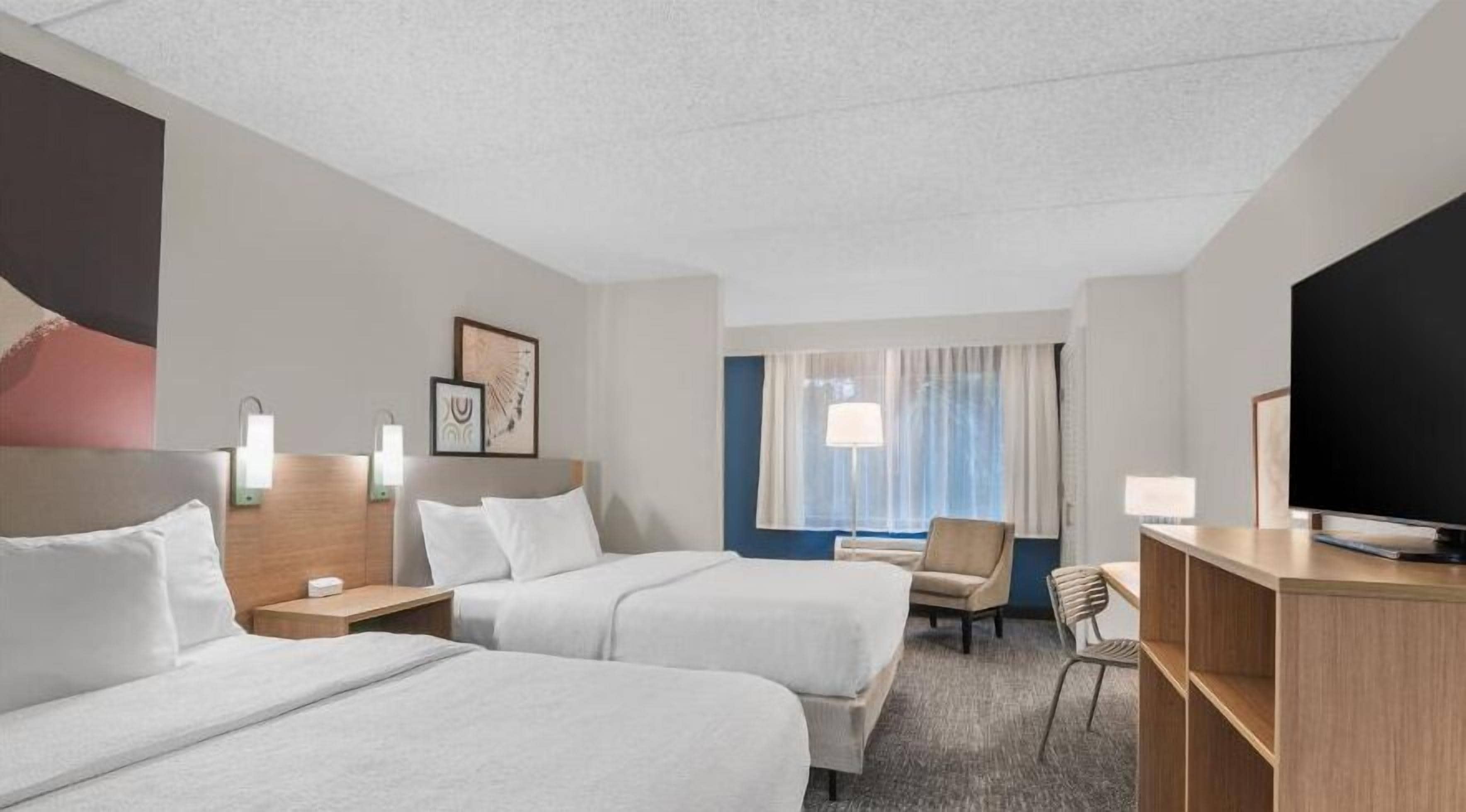 desk, blackout curtains, iron/ironing board, free cots/infant beds