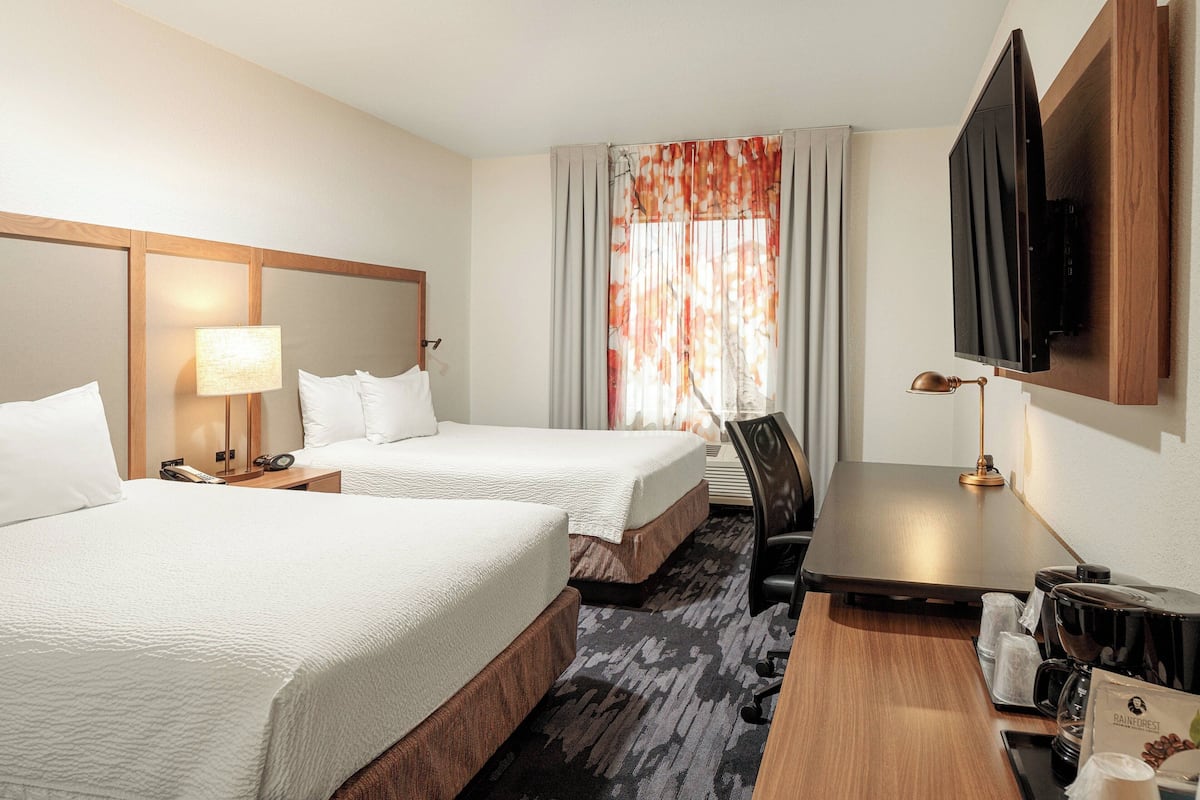 Premium bedding, down comforters, desk, laptop workspace