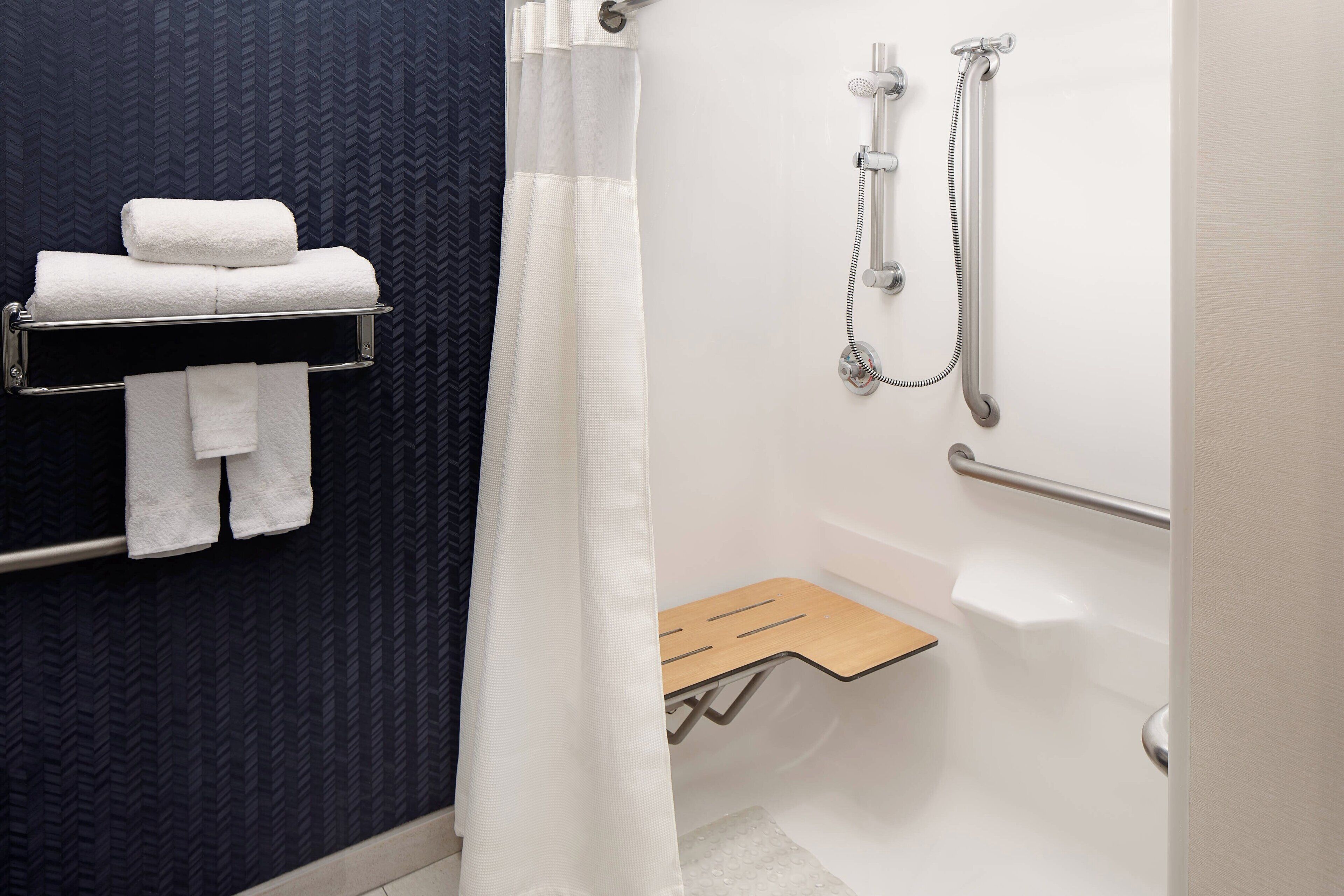 combined shower/bathtub, free toiletries, hair dryer, towels