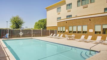 Seasonal outdoor pool, open 9:00 AM to 10:00 PM, pool loungers