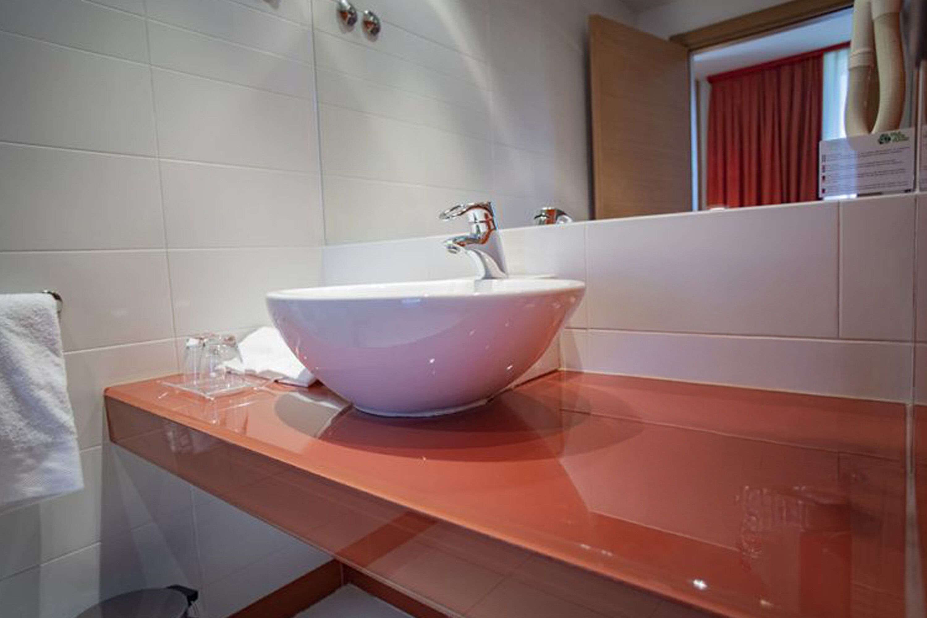 deep-soaking bathtub, rainfall showerhead, free toiletries, hair dryer