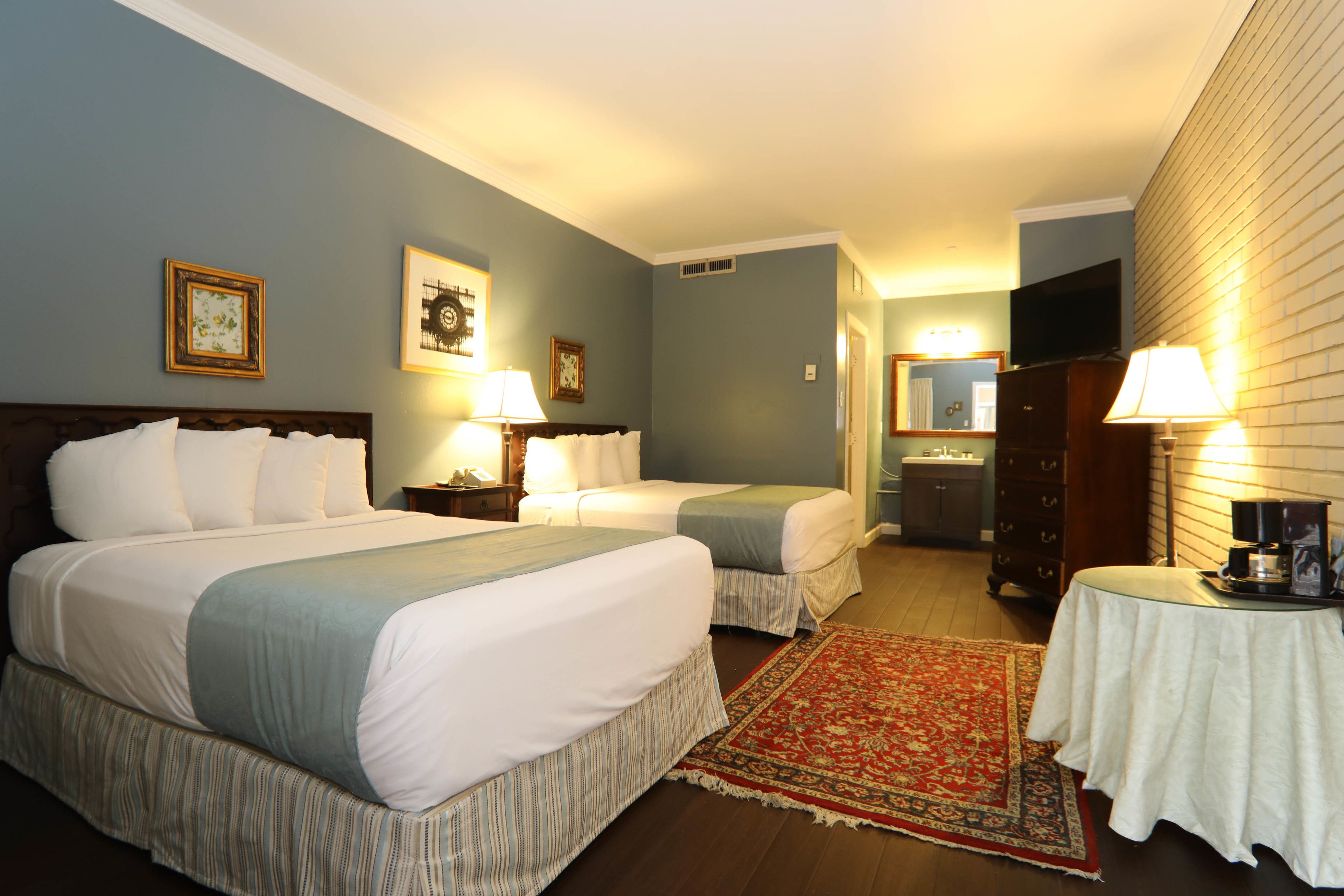 premium bedding, desk, blackout curtains, iron/ironing board