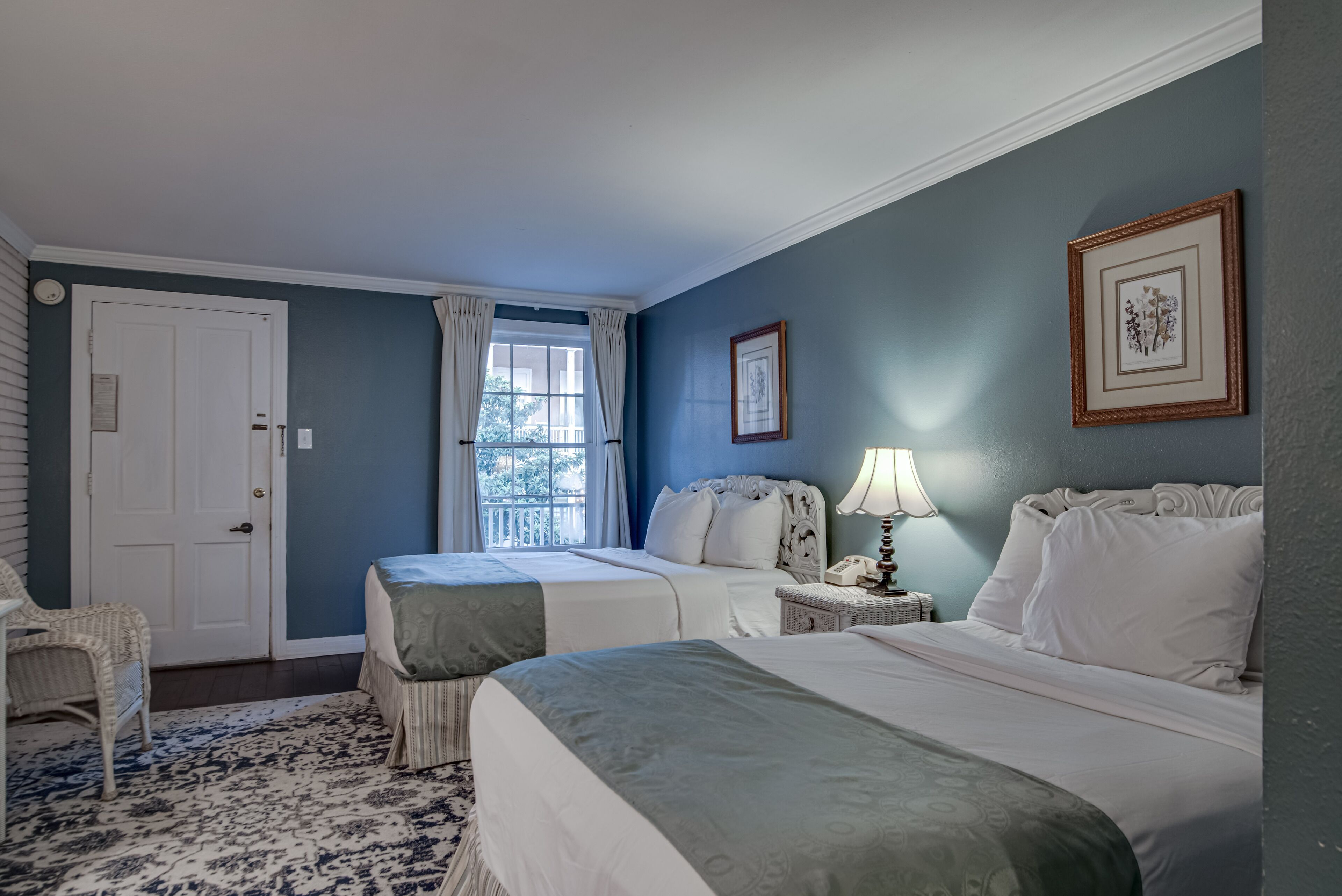 2 double beds, courtyard | premium bedding, desk, blackout curtains, iron/ironing board