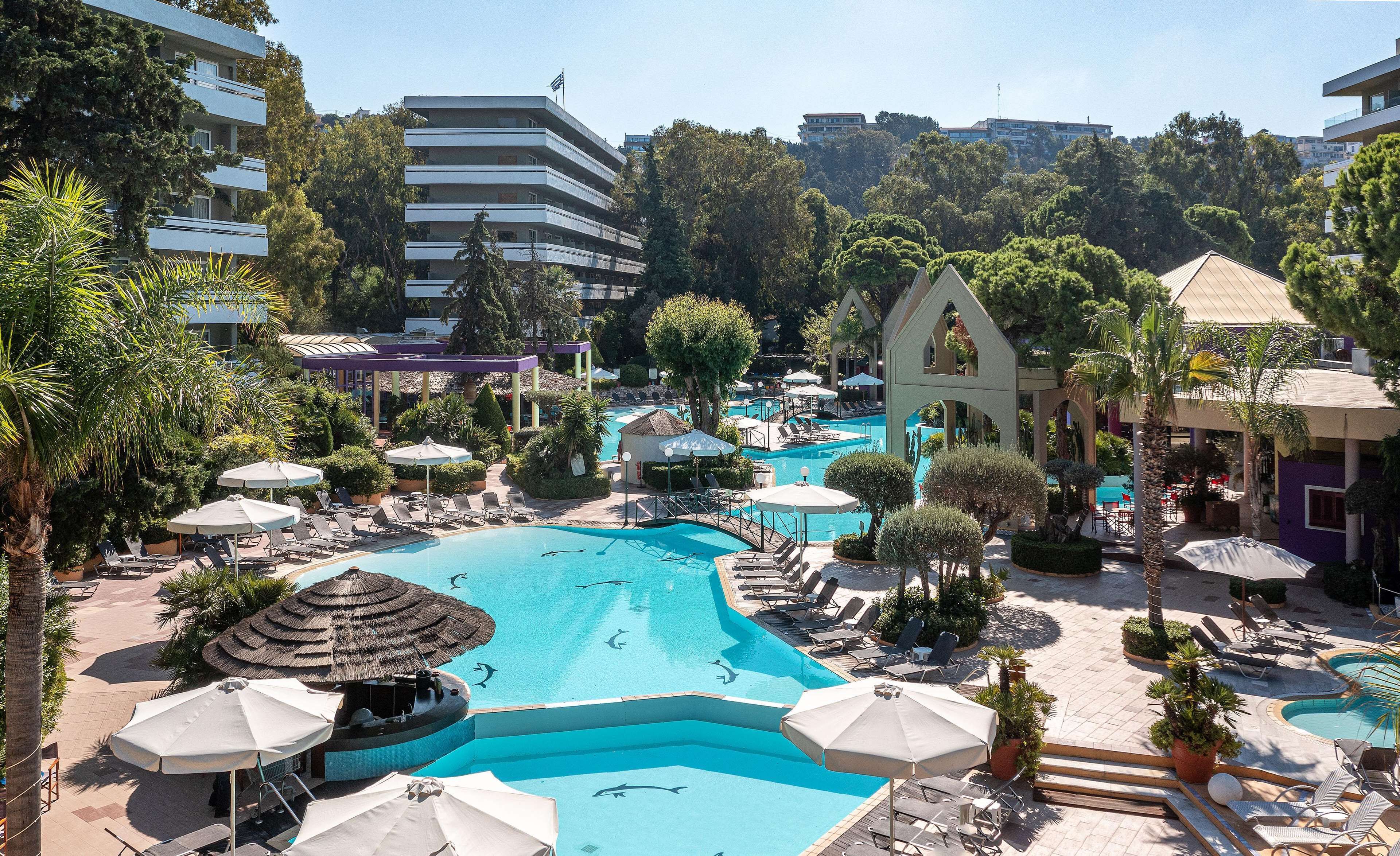 2 outdoor pools, open 8:00 am to 6:00 pm, pool umbrellas, pool loungers