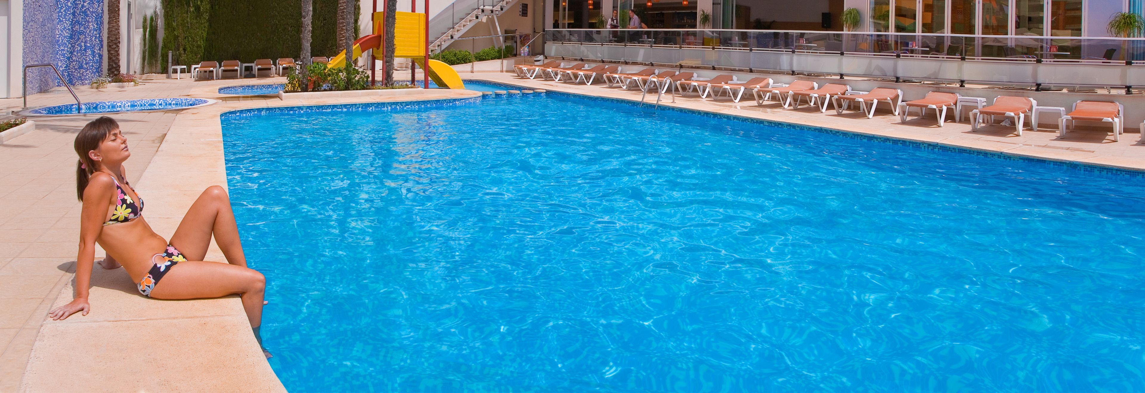 2 outdoor pools, pool umbrellas, pool loungers