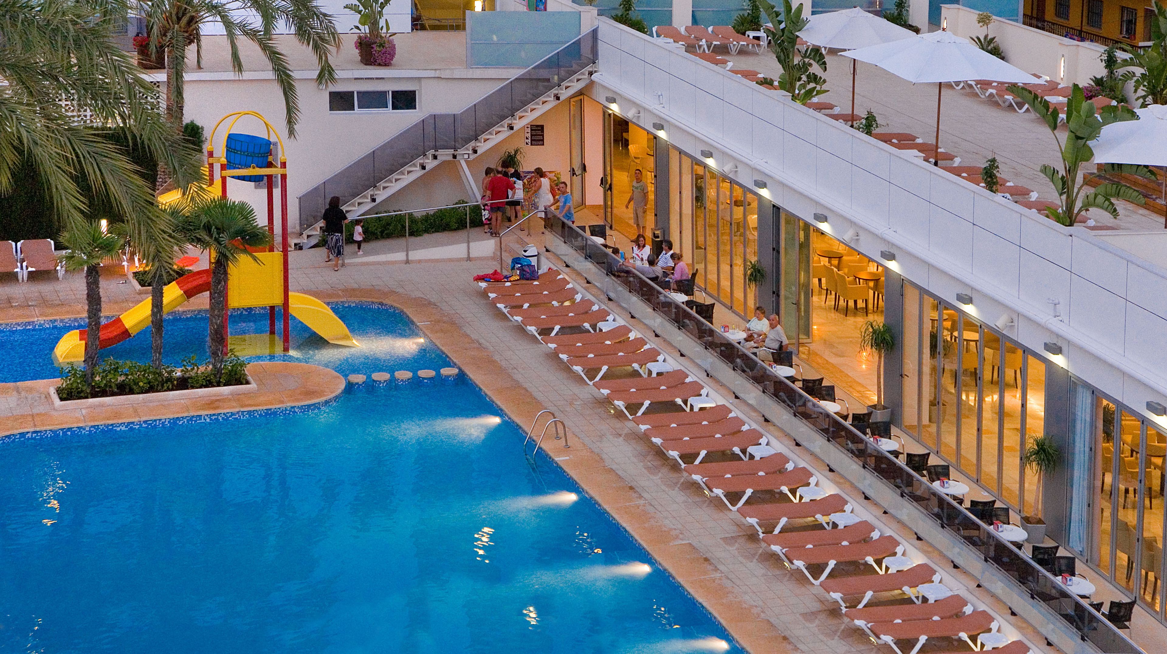 2 outdoor pools, pool umbrellas, pool loungers