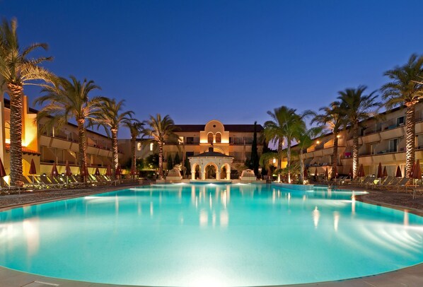 Indoor pool, outdoor pool, open 9 AM to 7 PM, free pool cabanas