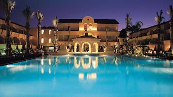 Indoor pool, seasonal outdoor pool, open 9 AM to 7 PM, free cabanas