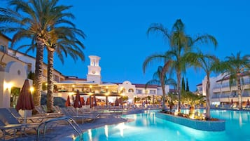 Indoor pool, seasonal outdoor pool, open 9 AM to 7 PM, free cabanas