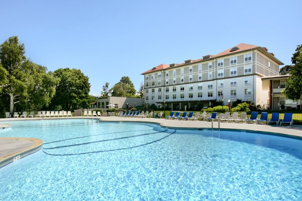 Indoor pool, seasonal outdoor pool, pool umbrellas, pool loungers