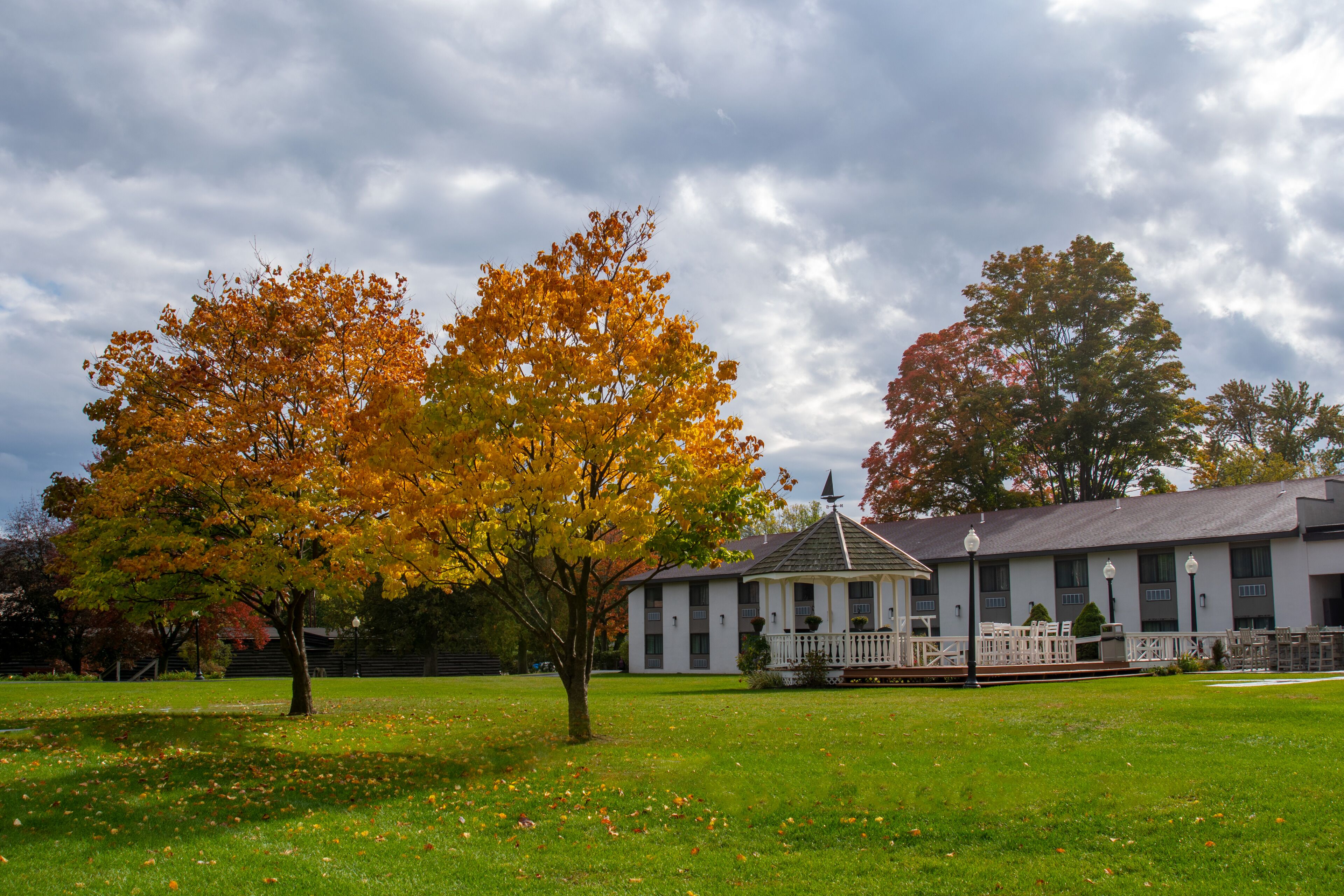 A building with a white exterior and a porch with columns.