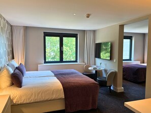 Premium bedding, memory-foam beds, in-room safe, desk