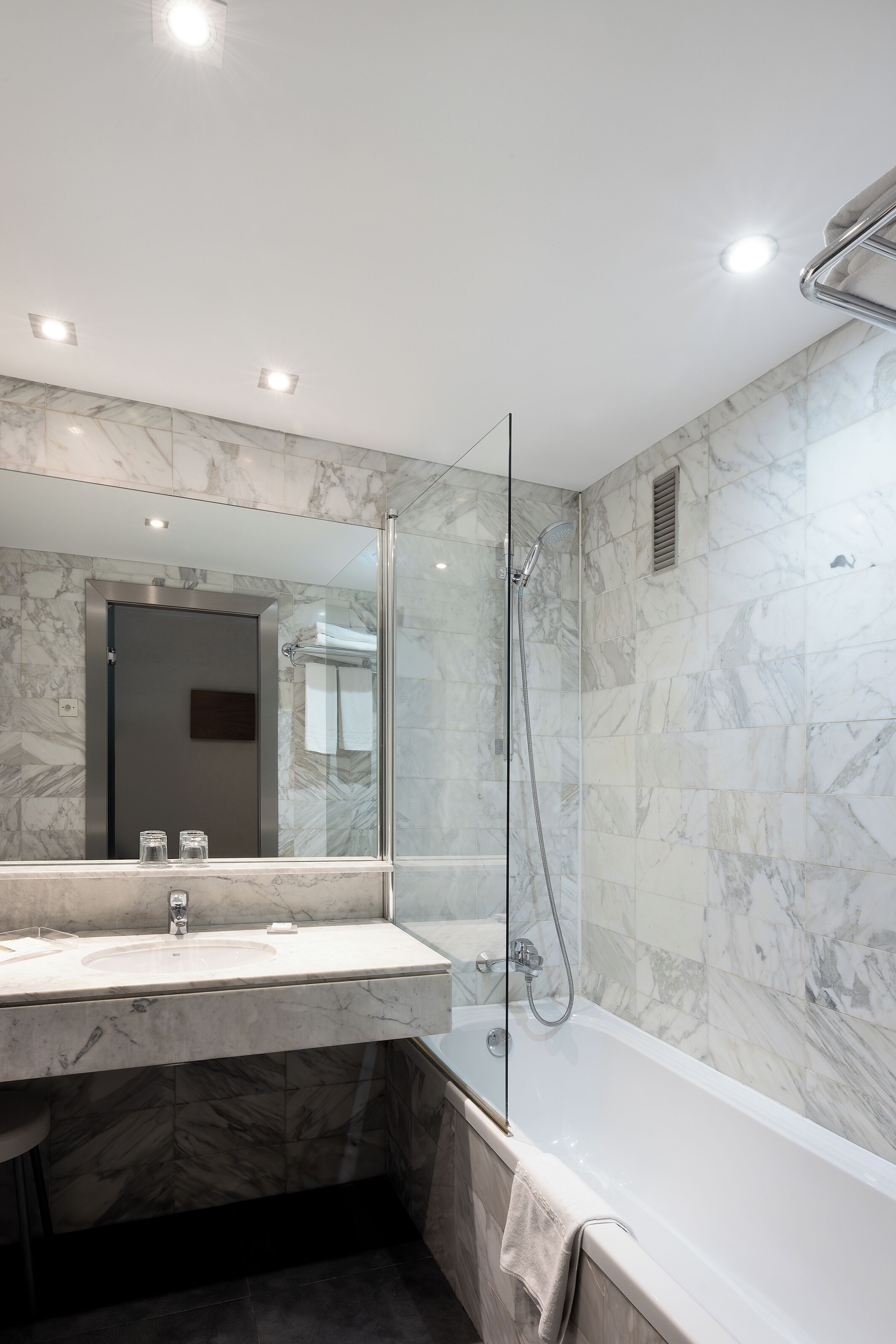 eco-friendly toiletries, hair dryer, towels