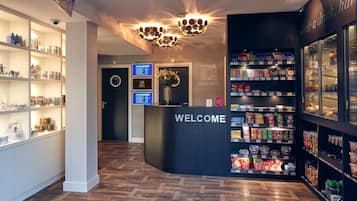 Sjálfsafgreiðslustöð fyrir innritun/brottför