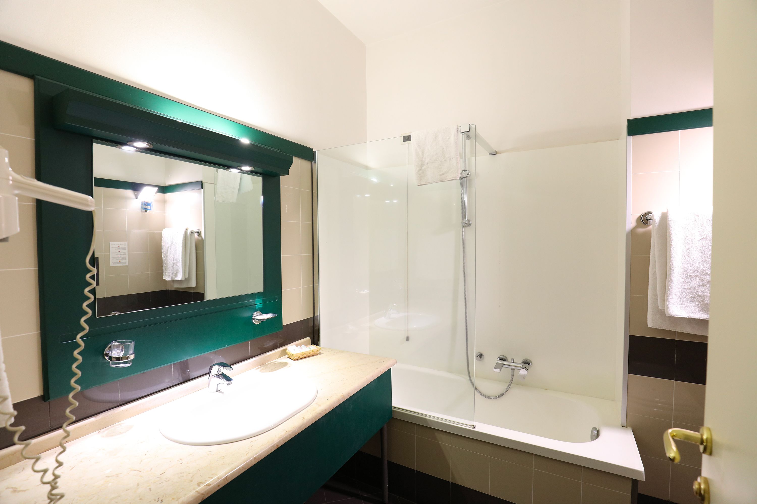 free toiletries, hair dryer, slippers, bidet