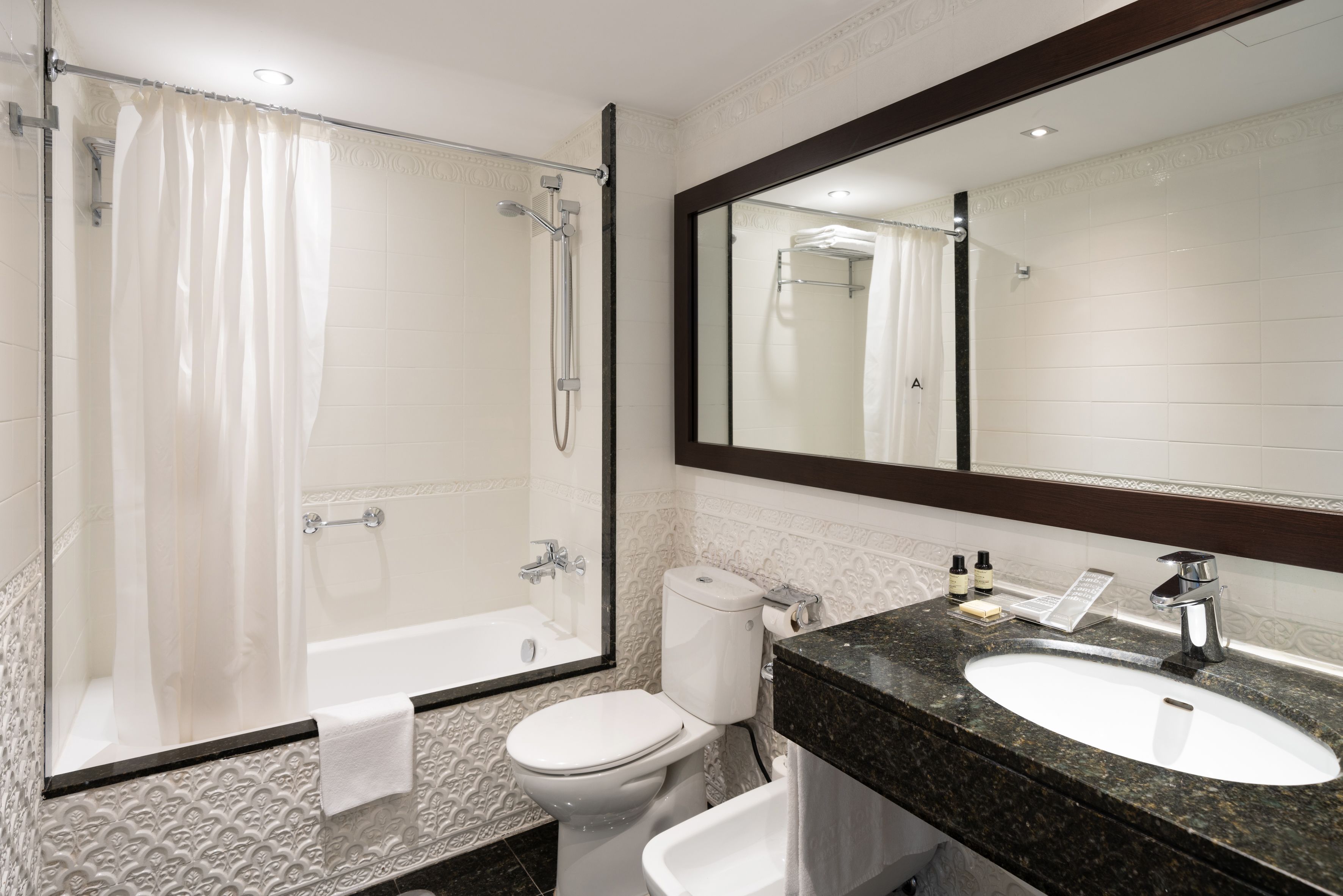 triple room | bathroom | eco-friendly toiletries, hair dryer, towels