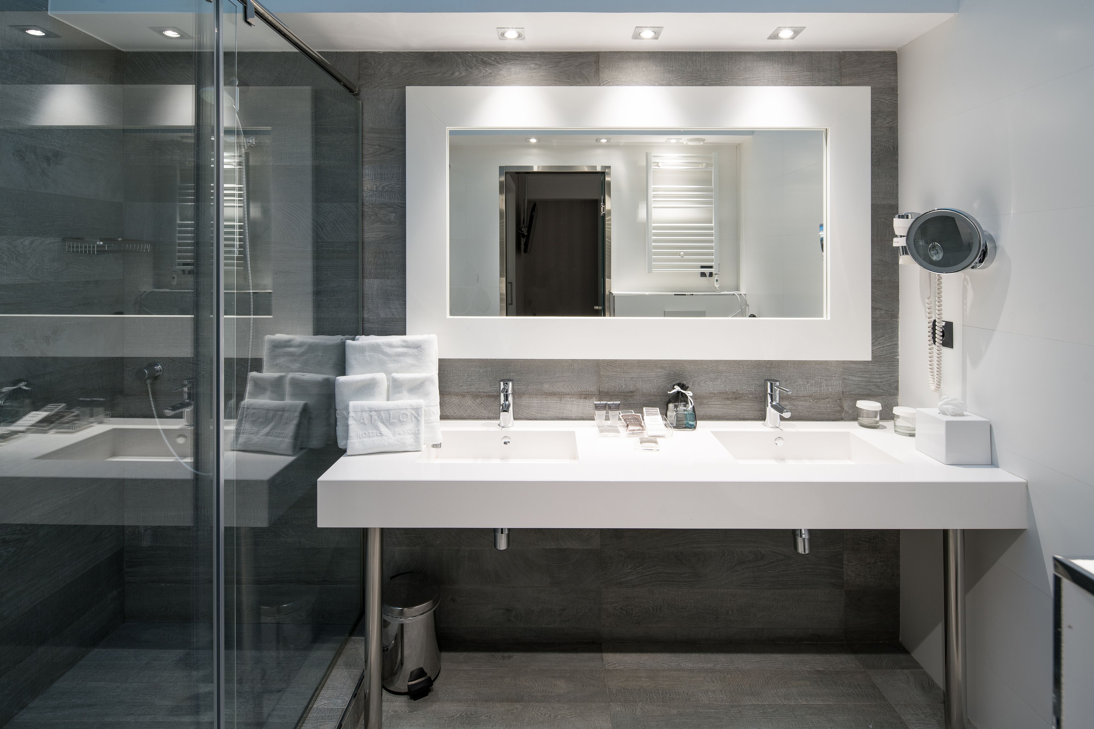 eco-friendly toiletries, hair dryer, towels