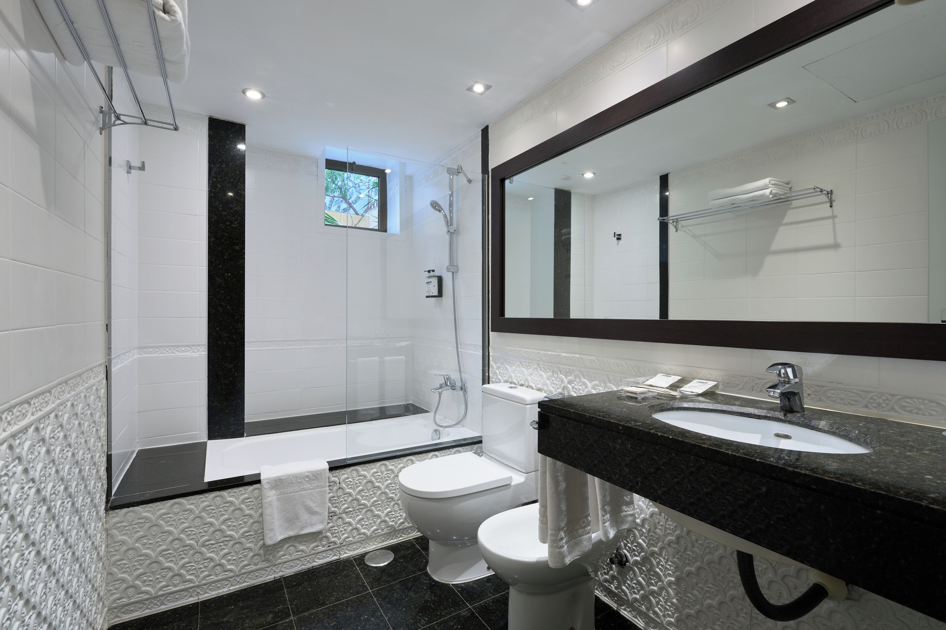 family room | bathroom | eco-friendly toiletries, hair dryer, towels