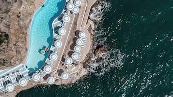 Outdoor pool, pool umbrellas, pool loungers