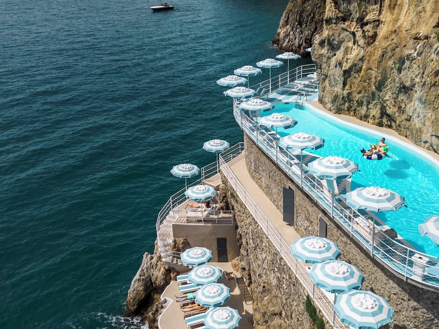 Outdoor pool, pool umbrellas, sun loungers