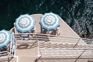 Private beach, sun loungers, beach umbrellas, snorkeling