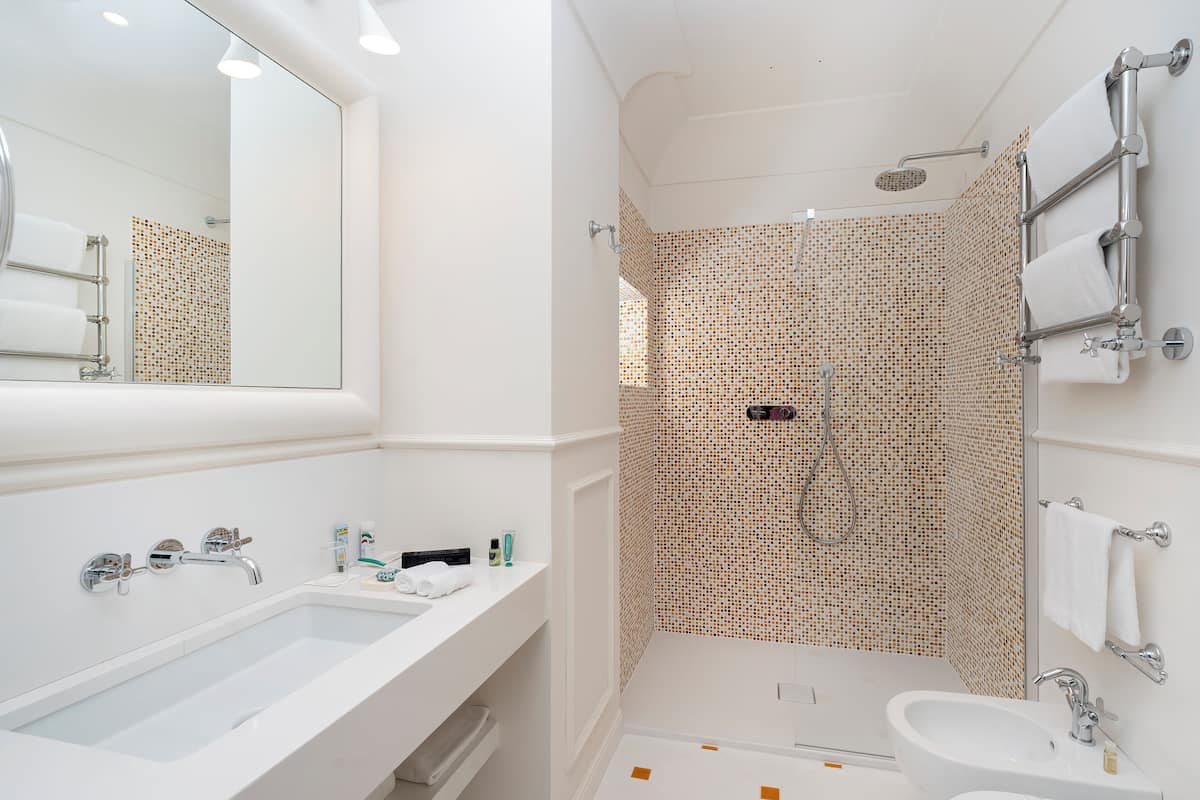 superior double room, sea view | bathroom | eco-friendly toiletries, hair dryer, bathrobes, slippers