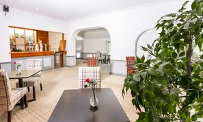 Dinner served, British cuisine, garden views 