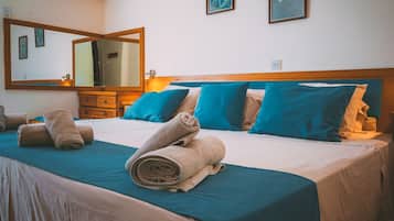 Egyptian cotton sheets, blackout curtains, iron/ironing board