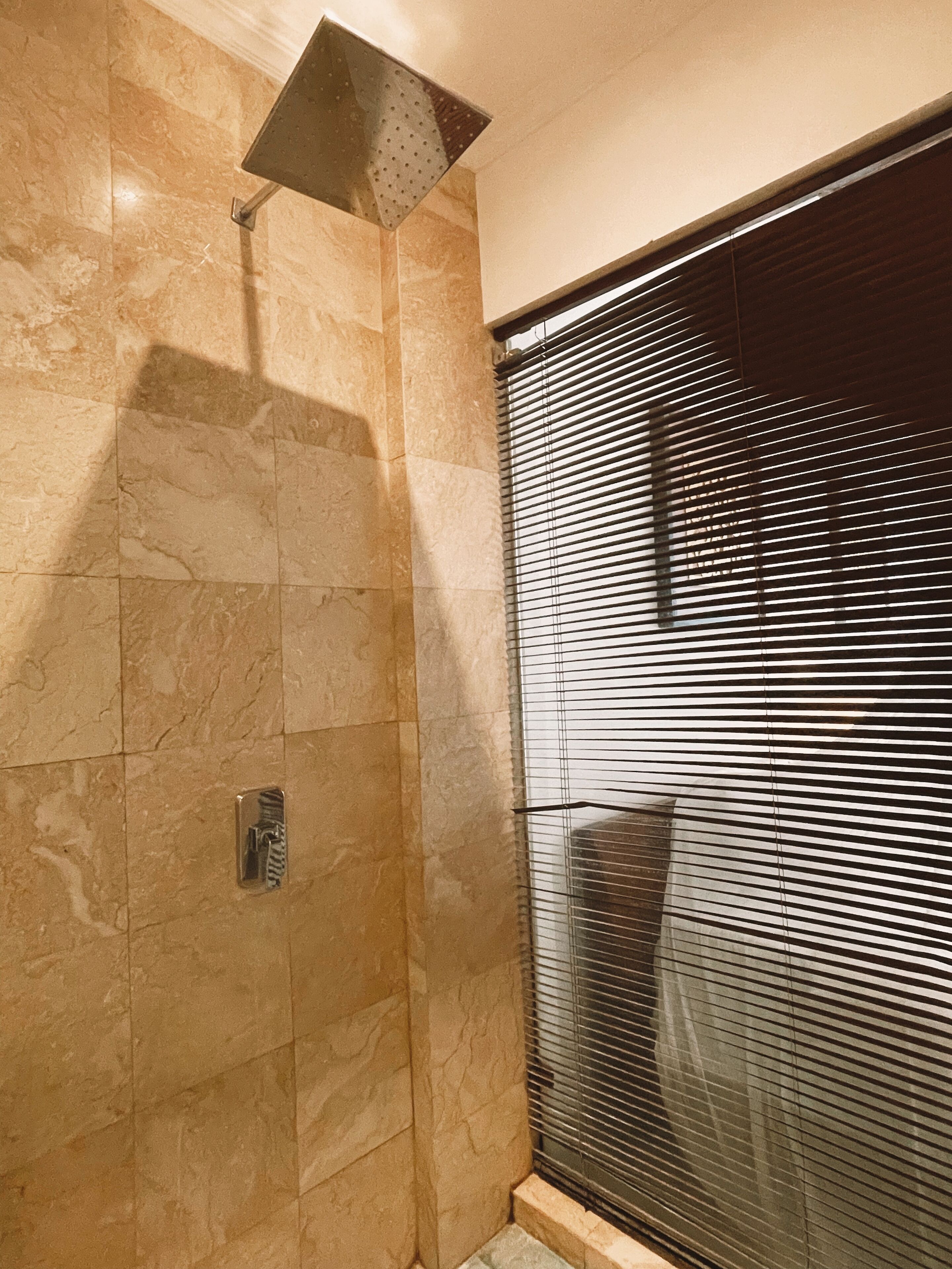 deluxe twin room, pool view | bathroom | shower, free toiletries, hair dryer, towels