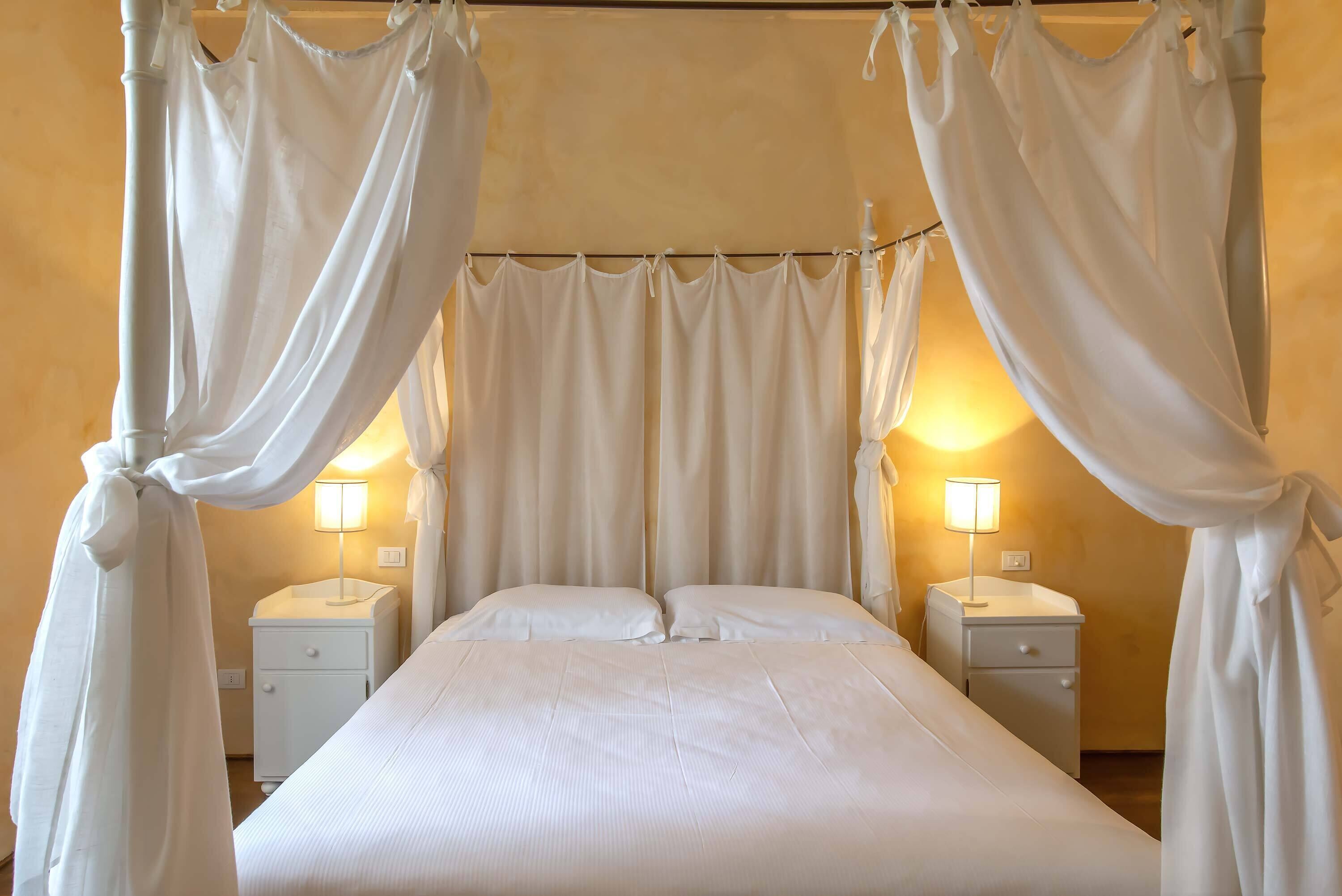 Premium bedding, down duvets, Select Comfort beds, minibar