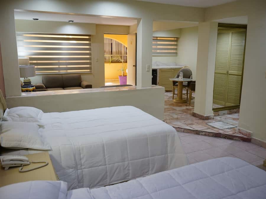 Junior Quadruple Room, 2 Double Beds | Desk, soundproofing, free WiFi, bed sheets