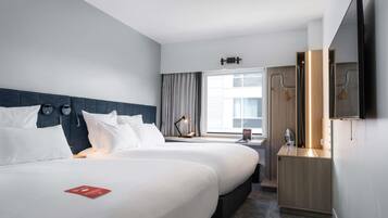 Hypo-allergenic bedding, down duvets, desk, blackout curtains